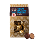 Packaging of Rhythm 108 Crispy Hazelnut Praline truffles with a decorative pattern.